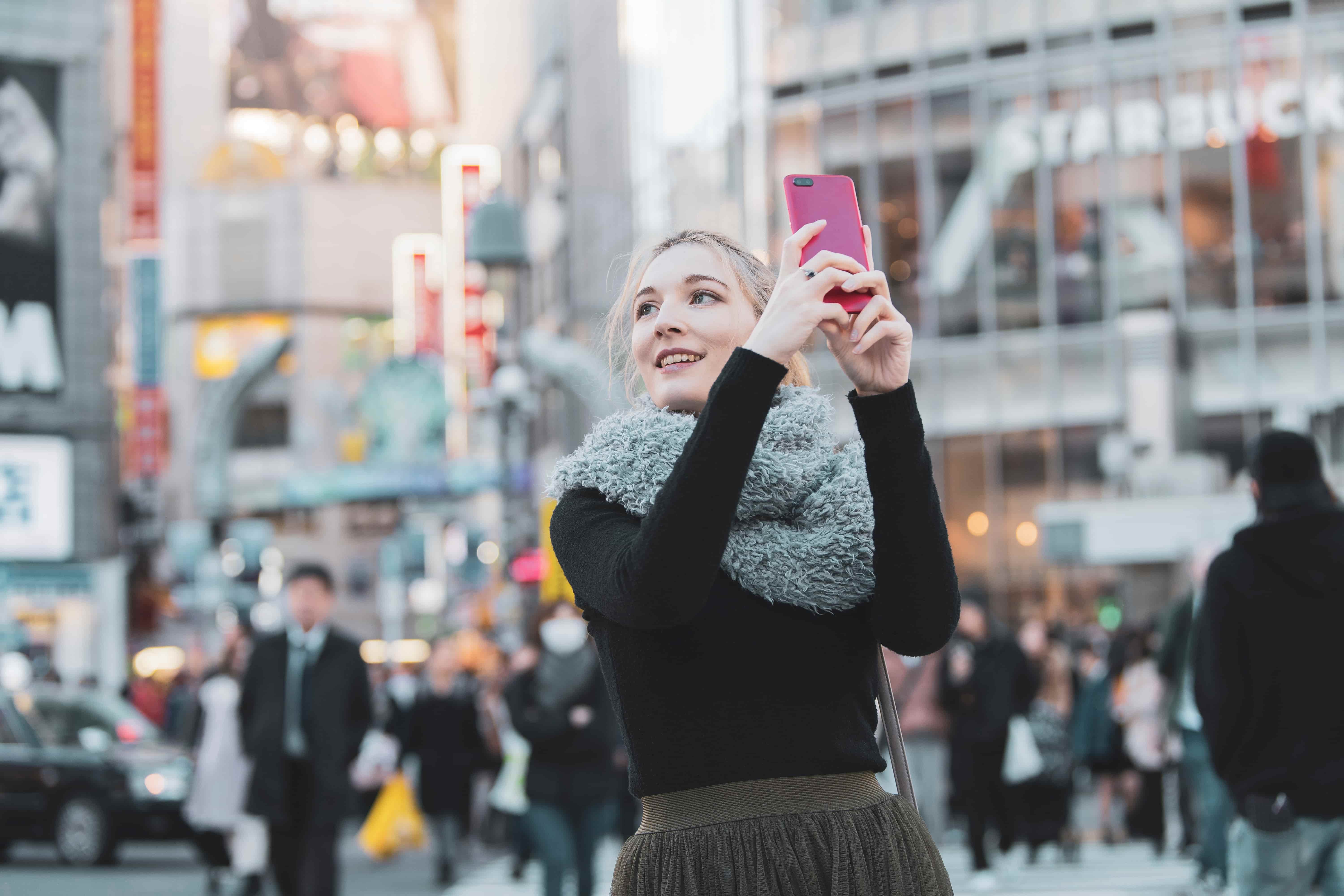 Happy tourist continuing their trip in Japan with confidence after receiving medical care