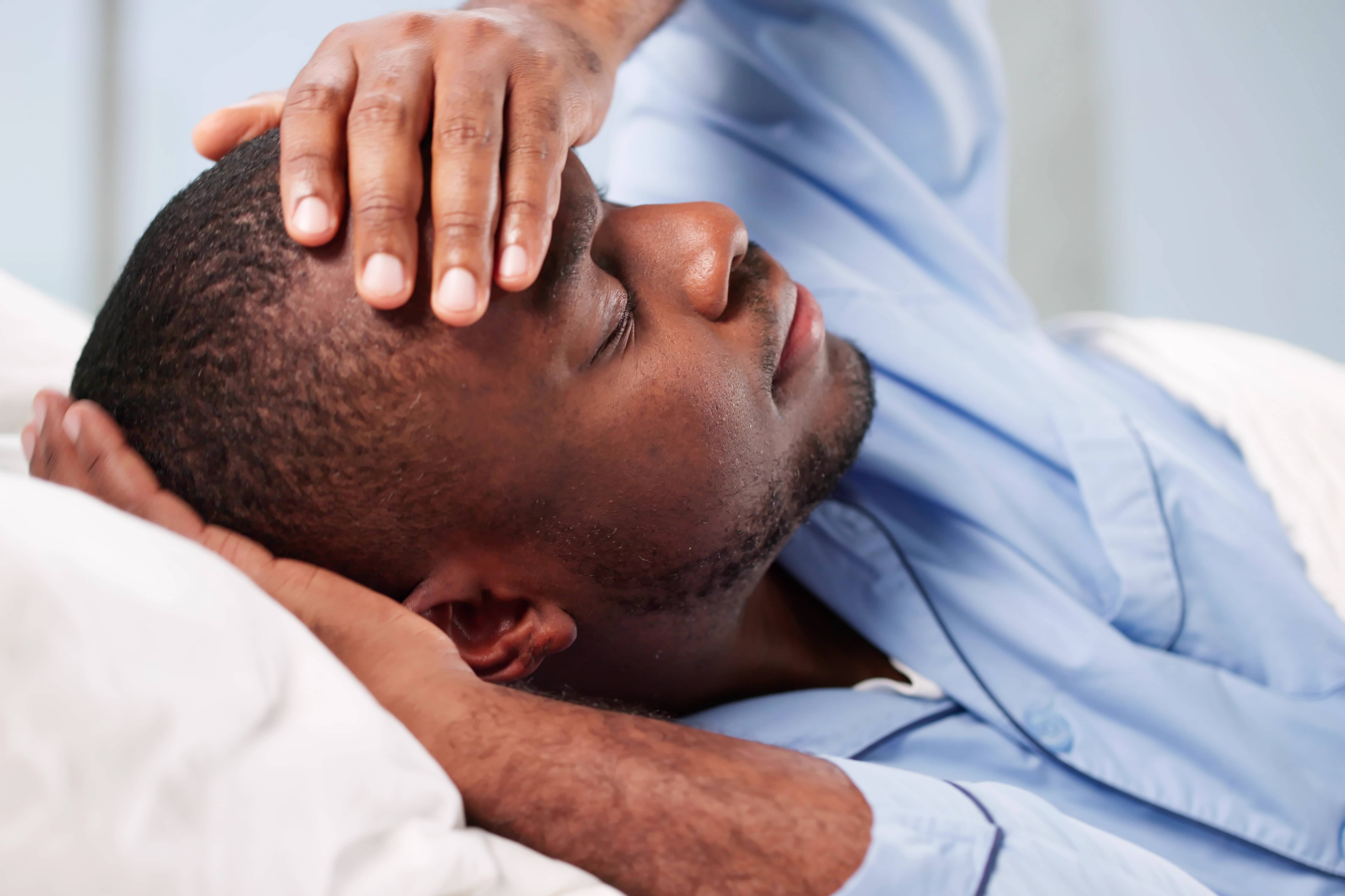 Traveler experiencing fever and fatigue symptoms - systemic health issues during Japan travel