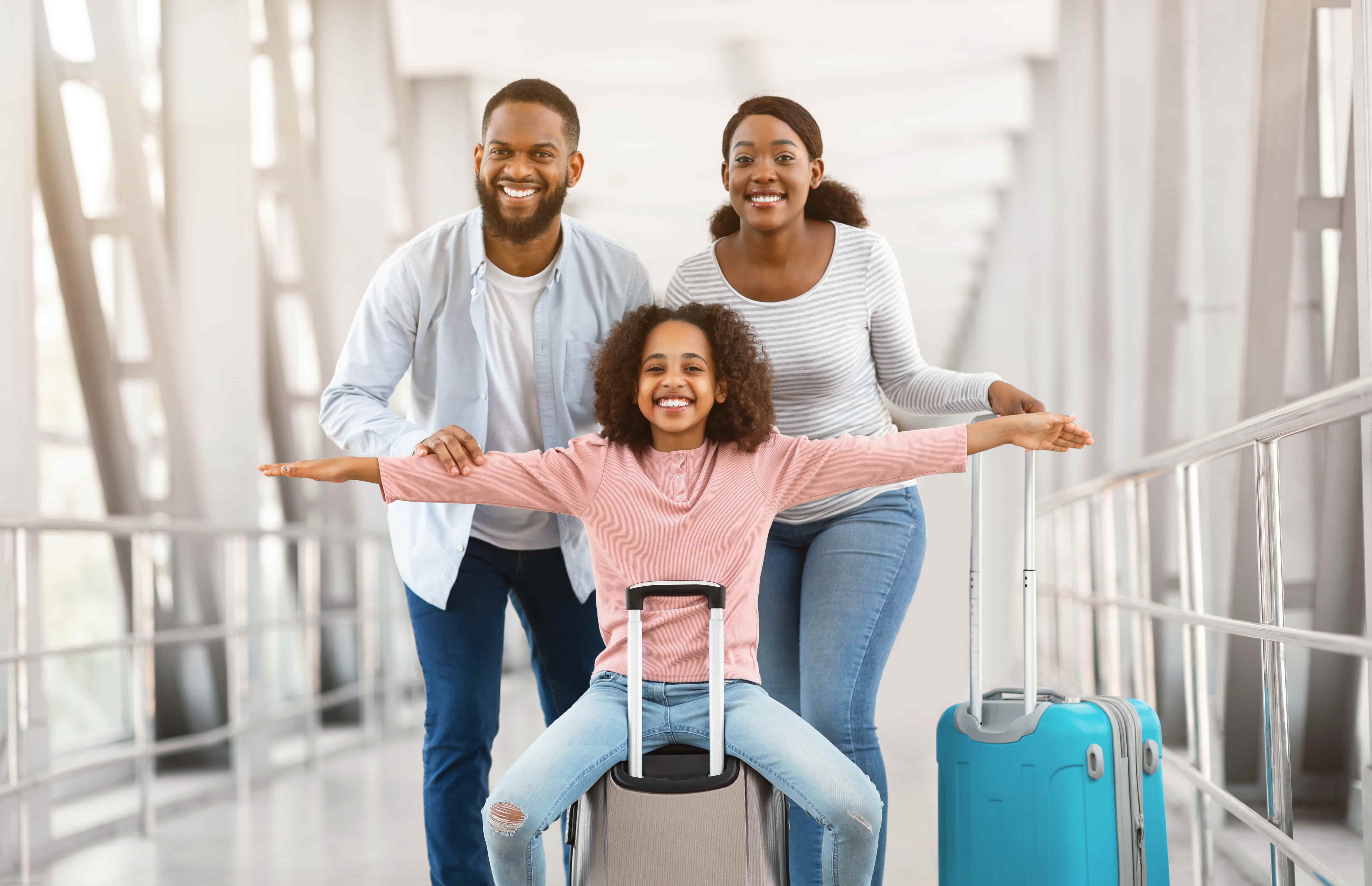 Family with luggage ready to travel home safely after child recovery